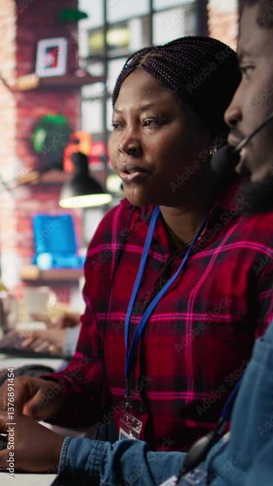 Poster vertical video call center coworkers in office helping customers regain access to accounts using ai,