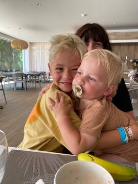 Nephews cuddling during holiday