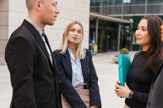 an attractive woman looking at her office mate