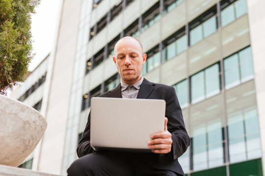 a businessman in front of the office