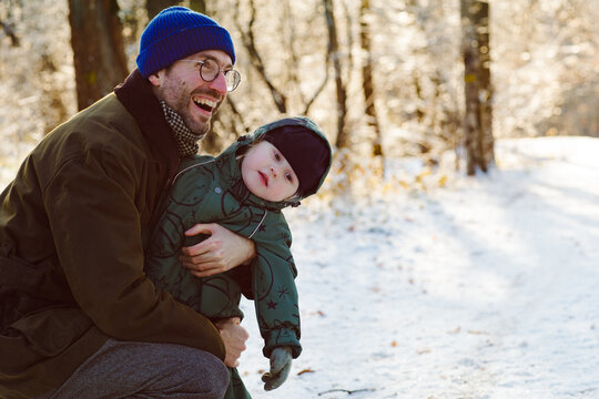 father and son on a winter walk