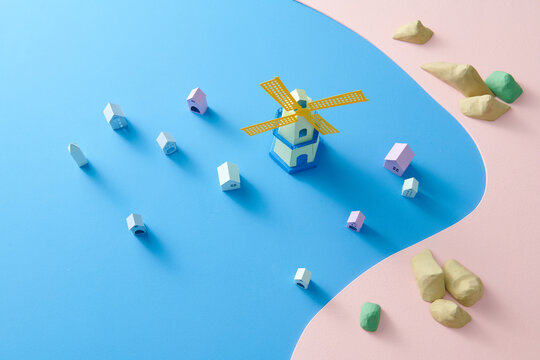 Colorful Miniature Landscape with Windmill and Tiny Houses