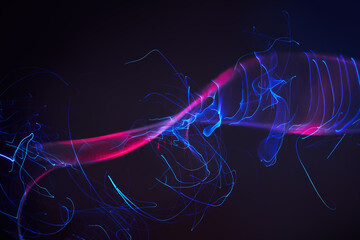 Abstract light streaks move on dark background