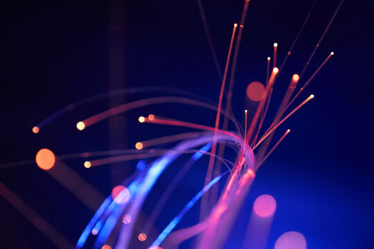 Radiant fiber optic threads in motion