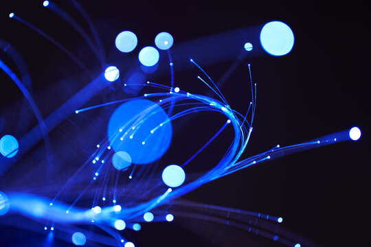 Glowing fiber optic light strands