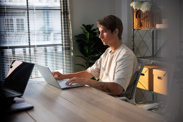 Male manager attending online meeting in office