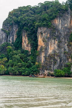 Towering Limestone Cliffs by the Water