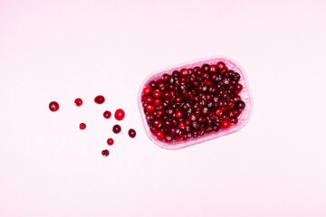 Juicy fresh sweet delicious red cranberries and hard direct flashlight