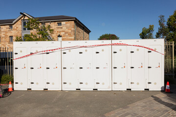Public Bathrooms in Urban Setting with Warning Tape in Sydney