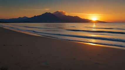 Obraz premium Very beautiful sunset on the beach with visible mountains in the distance