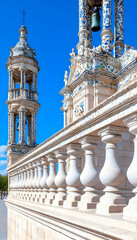 Ornate white balustrade, bell tower, and azulejo-tiled church under a vibrant blue sky AI generative