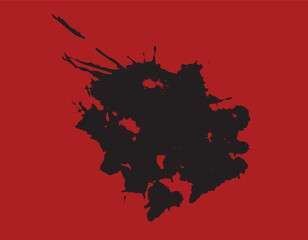 Black ink splashing on red background creating abstract shape