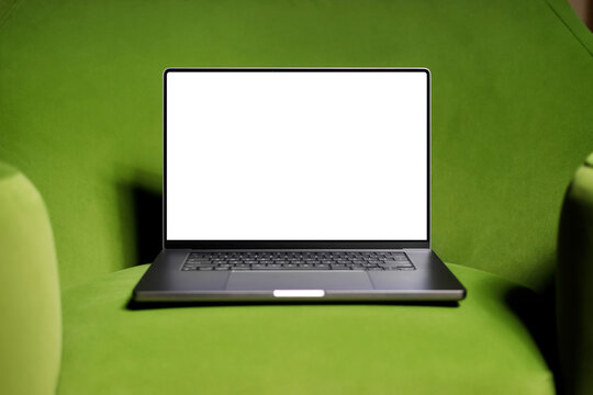 Laptop Mockup On A Green Chair