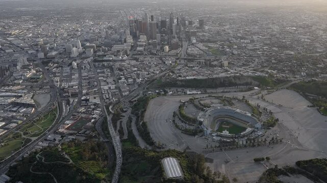 Aerial view of Dodger Stadium and Chavez Ravine at Sunset with Downtown Los Angeles in the background
