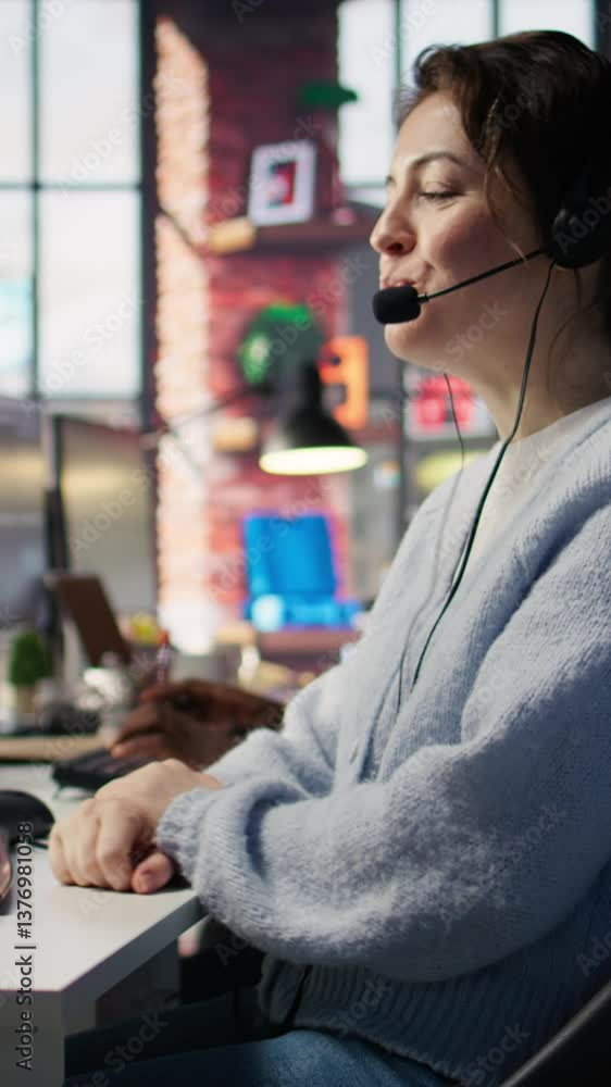 Poster vertical video happy call center agent in office helping customers by answering questions, solving i