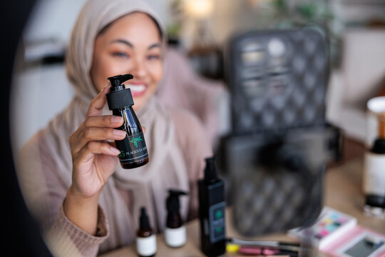 Woman selling product to online audience