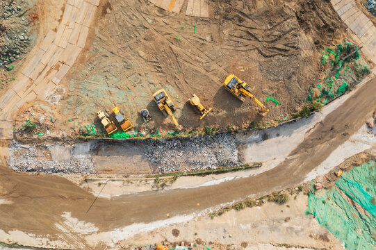 Aerial View of Excavators Digging at Construction Site