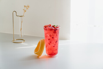 Refreshing hibiscus lemon sparkling lemonade with fruit and ice