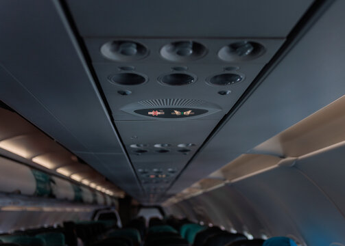 Air conditioning vents on ceiling of passenger aircraft