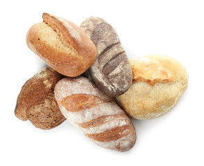 Different loaves of freshly baked bread isolated on white, top view