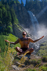 Tourist breathing and relax in nature. Meditation, spiritual wellness. Calm, athlete and freedom in environment. Training mindfulness. Relaxed man in nature. Freedom and happiness lifestyle.