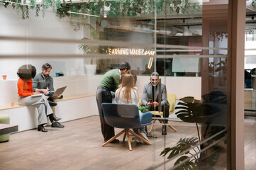 Modern workspace with collaborative business meeting and teamwork