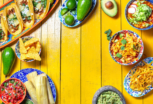 Colorful spread of traditional Mexican dishes featuring tortilla fried Aztec soup and chalupas for celebratory gatherings