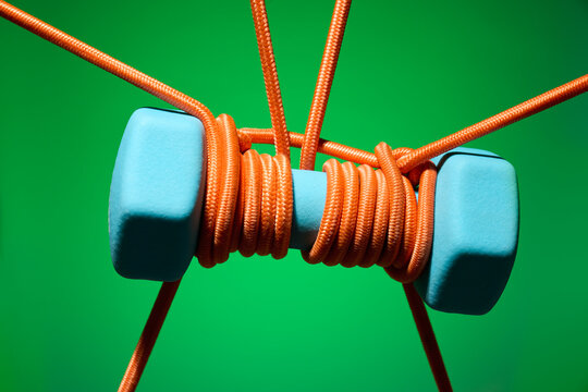 Close-Up of Ropes and Weights in Tension