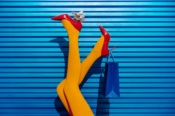 Shopping Bag Hanging From One Heel, While Receipts Stacked on Other
