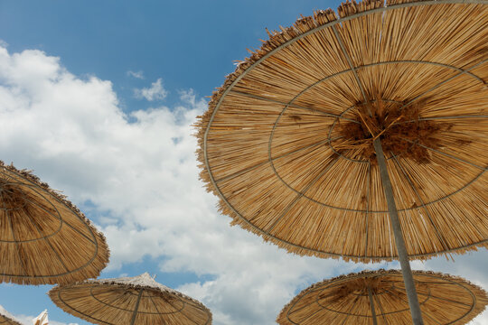 straw beach umbrellas