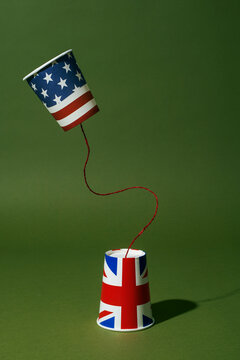 string telephone with the american and the british flags