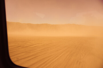 A view of desert from local transportation in Algeria