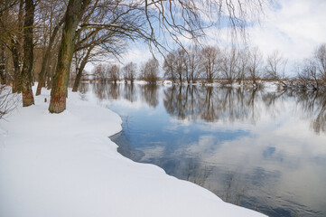 A wonderful sunny day in winter. Blue sky over a winter landscape.
