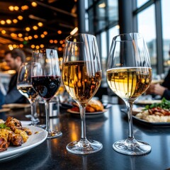 Naklejka premium A table with a variety of food and drinks, including wine glasses