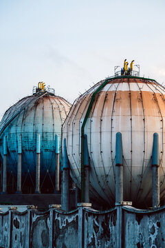 Industrial Spherical Storage Tanks at Sunset