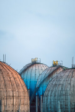 Spherical gas storage tanks dominating industrial landscape