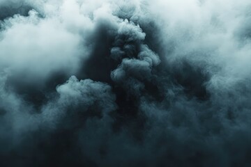 Obraz premium Dense, swirling clouds of dark smoke create a dramatic and mysterious atmosphere.