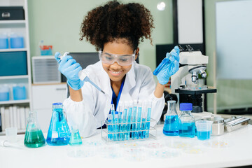 female scientist working with micro pipettes analyzing biochemical samples, advanced science...