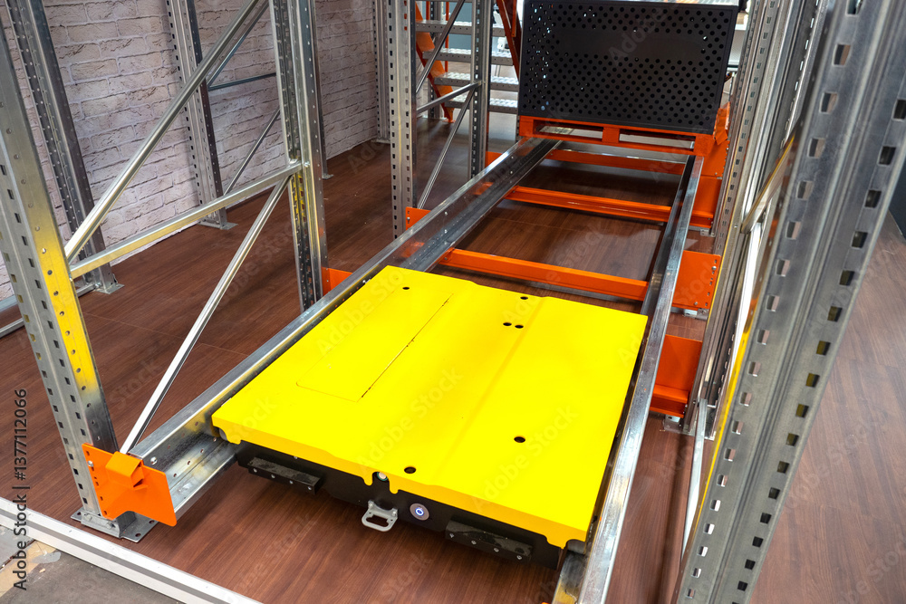Aufkleber shuttle racks. warehouse equipment. shuttle racks with yellow lifting platform. warehouse automation