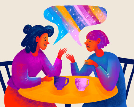 Friends enjoying conversation over coffee in a cozy cafe setting