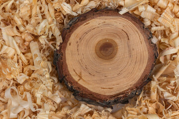 Wooden Cross Section with Sawdust Background