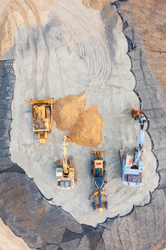 Aerial Shot of Construction Machines Working on a Site with Geom