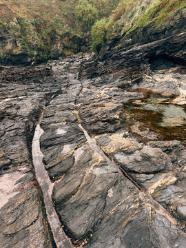 Worn cart tracks in rock from past smuggling activity in Prussia Cove