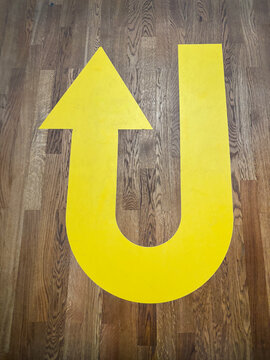 yellow arrow on floor