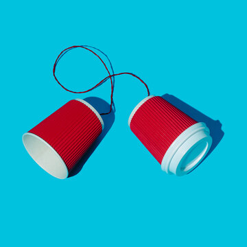 red string telephone with one end blocked