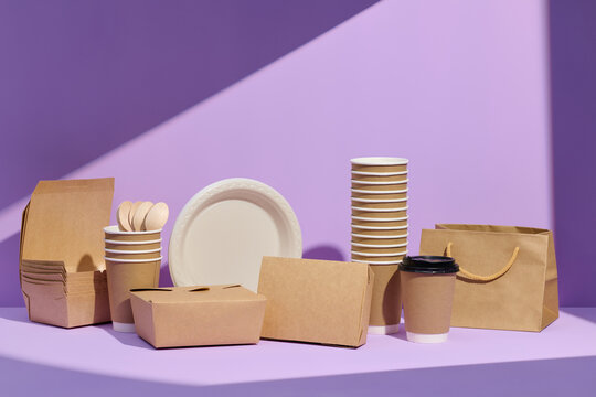Eco-Friendly Disposable Tableware and Packaging on Lavender Background