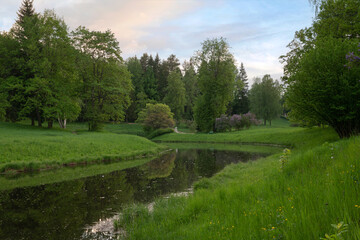 Slavyanka River Valley in the landscape part of the Pavlovsk Palace and Park Complex on a sunny summer day, Pavlovsk, Saint Petersburg, Russia