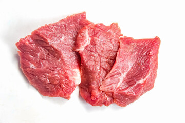 fresh red beef meat cut pieces isolated on white background