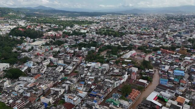 Aerial view of Mae Sai downtown and Tachileik town with Sai river a river that forms the natural border between Thailand and Myanmar at Tachileik and Mae Sai districts.