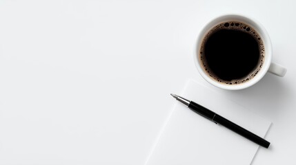 Flatlay of a wellorganized business continuity guide with a pen and coffee cup